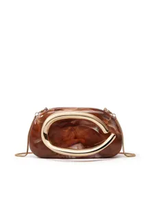 Brown marbled resin clutch bag featuring a statement gold metal C handle and chain strap.