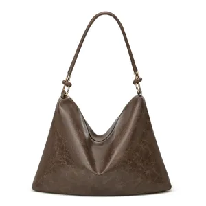 Braune weiche Leder-Umhängetasche Detail, vintage slouchy Hobo-Tasche mit Reißverschluss.