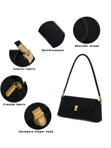 Detailed view of black suede underarm bag showcasing texture, metal lock, and strap features.