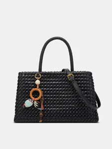 Black woven leather handbag for women, stylish casual tote bag with charm and shoulder strap.