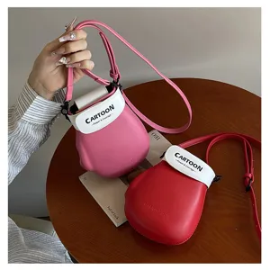 Leuke crossbody tas in de vorm van een bokshandschoen voor dames, kleine hippe telefoontas.