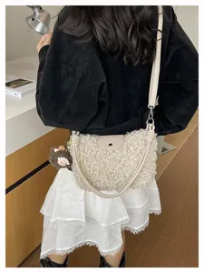 Women's cream sherpa crossbody bag, cozy autumn winter fuzzy shoulder handbag with cute sheep charm.