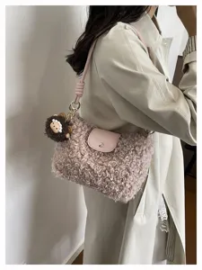 Sherpa crossbody bag for women, cute fluffy plush shoulder bag with charm pendant.