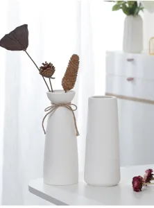 White minimalist ceramic vase set for home decor, dry flower arrangement and table display.