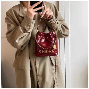Donna trapuntata pelle catena borsa a tracolla elegante secchiello borsa per ogni giorno.