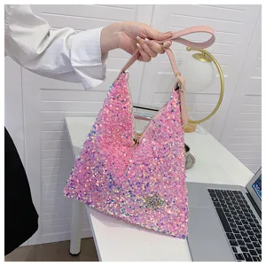 Pink sequin hobo shoulder bag for women, trendy stylish sparkly handbag with leather strap.