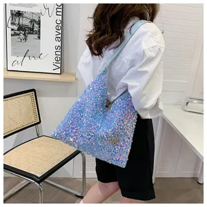 Fashion sequin shoulder bag detail, stylish hobo handbag with star charm for women daily wear.