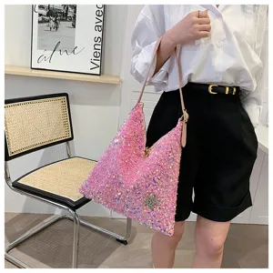 Stylish pink sequin shoulder bag for women, trendy underarm handbag with sparkling finish for use.