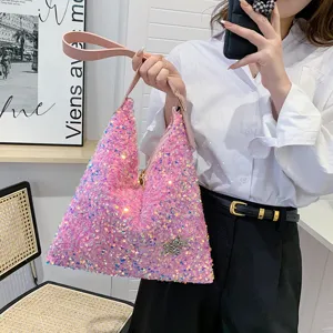 Pink sequin hobo shoulder bag for women, sparkly underarm handbag with star charm daily use.