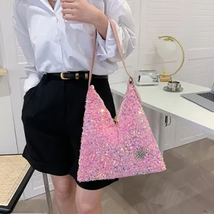 Pink sequin shoulder bag for women, sparkling underarm handbag with chic star decor.
