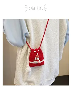 Kids Christmas crochet cross-body bag, cute snowman design, soft wool shoulder bag detail.