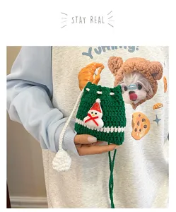 Cute Christmas crochet snowman crossbody bag detail view, handmade wool knit children bag.