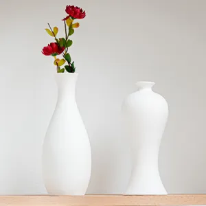 DIY unpainted ceramic vases set for kids painting and crafts, white bisque pottery models.