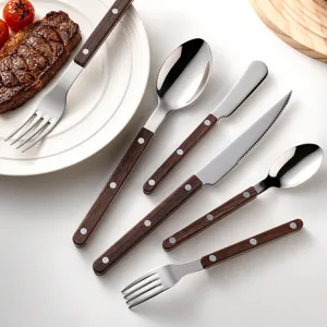 Stainless steel flatware set with wood grain handle, western tableware knife fork and spoon.