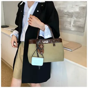 Stylish contrast handbag for women, autumn fashion tote bag with top handle and metal lock closure.