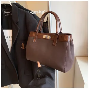 Brown contrast handbag for women, retro tote bag with top handle and metal lock detail.