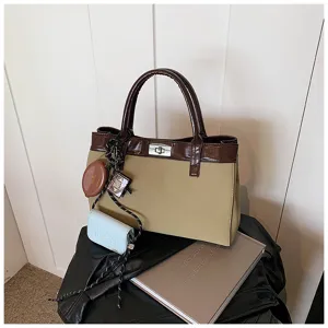 Women's stylish Maillard colorblock handbag, casual tote and crossbody bag with chic charms.