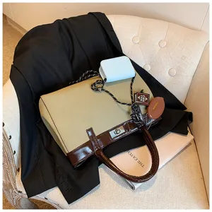 Stylish two-tone tote handbag for women, chic retro shoulder bag with secure turn lock.