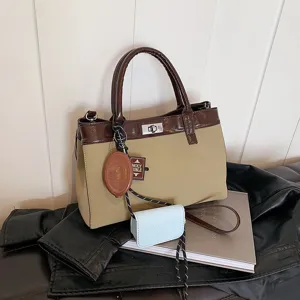 Chic Maillard style women top-handle handbag, contrast color casual crossbody bag with charms.