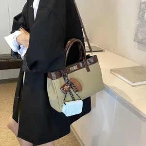 Maillard shoulder handbag women autumn new casual crossbody tote bag with chic charms.