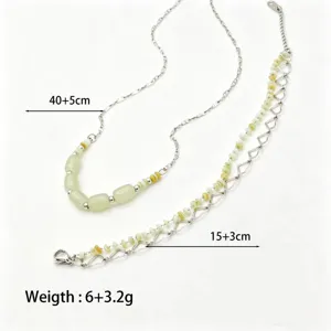 Detailed view of the elegant green beaded necklace and sweet heart bracelet set.