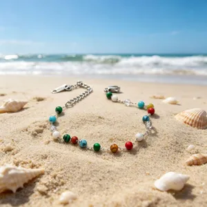 Bohemian style colorful beaded bracelet detail shot on sandy beach with ocean background close up