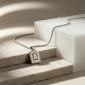 Stainless steel letter A pendant necklace with rope chain, trendy hip-hop style jewelry.