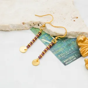 Niche creative design ethnic retro beaded drop earrings, light luxury style gold-plated metal jewelry.