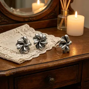 Vintage silver flower jewelry set featuring exquisite twisted petal design for elegant daily look.