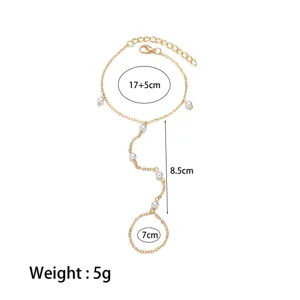 Detail view of gold slave bracelet with pearls, showing dimensions and 5g lightweight design.