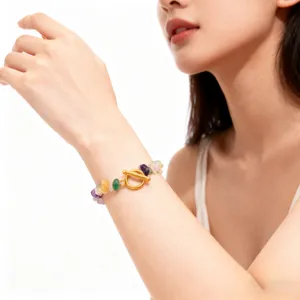 Close-up detail shot of the natural irregular stone gemstone bracelet with 18k gold plated OT buckle.