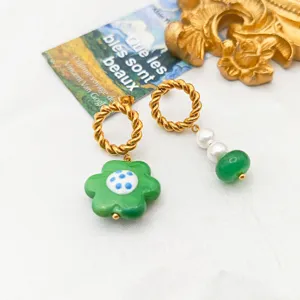 Asymmetric glass flower pearl earrings, stainless steel gold twisted hoops for women daily style.