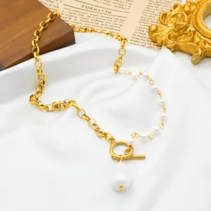 French asymmetric OT clasp baroque pearl necklace detail, 18k gold plated steel choker.