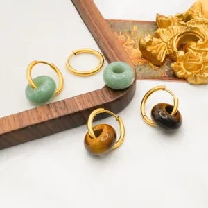 Elegant 18k gold plated stainless steel hoop earrings featuring natural stone charms.