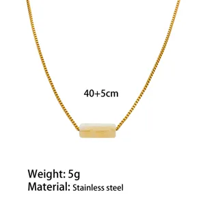 Close-up view of the stainless steel box chain necklace with geometric resin pendant detail.