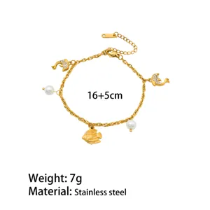 Gold stainless steel marine bracelet with fish and pearls 16+5cm adjustable length.