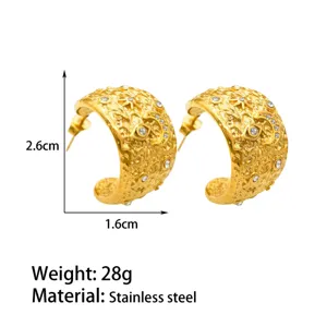 Gold stainless steel textured chunky C-shaped hoop earrings with sparkling clear rhinestones for women.