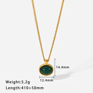 Detailed view of the elegant oval green gemstone pendant necklace with gold plated chain.