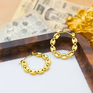 Close-up detail of 18k gold plated stainless steel hoop earrings with unique bean link design.
