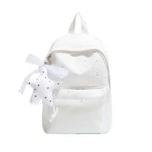 Sac à dos blanc style coréen avec motif étoiles et joli nœud en dentelle pour usage.