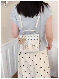 College style bow print mini backpack for women, cute casual daily travel school bag.