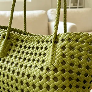 Green woven leather tote bag summer beach handbag stylish hollow shoulder bag detailed view