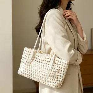 Chic summer hollow woven shoulder bag, perfect beach vacation tote and stylish daily basket handbag.
