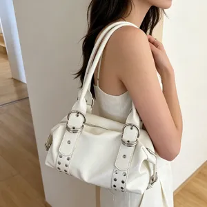 Vintage white PU leather Boston underarm shoulder bag with metal buckles and rivet details for women.