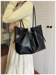 Vintage soft leather tote bag for women, large capacity casual commuting shoulder handbag.