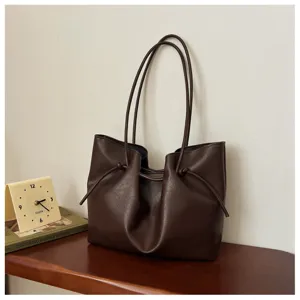 Retro brown leather tote bag, large capacity shoulder bag for women daily commuting.