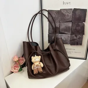 Borsa a secchiello vintage in pelle PU marrone da donna, grande borsa a tracolla con ciondolo.