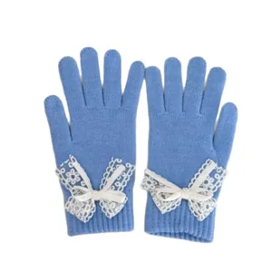 Blue knitted gloves with white lace and ribbon bow for stylish women in autumn and winter.