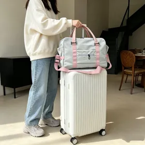 Borsa da viaggio in nylon con manica per valigia, grande borsa da palestra grigia e rosa.