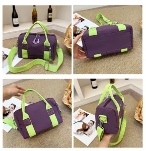 Detailansicht der lila und limettengruenen Oxford-Stoff Reisetasche mit Schultergurt.